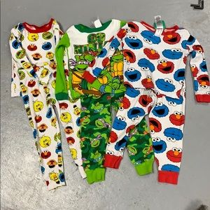 Sesame Street and TMNT pajama bundle.  Size 3T